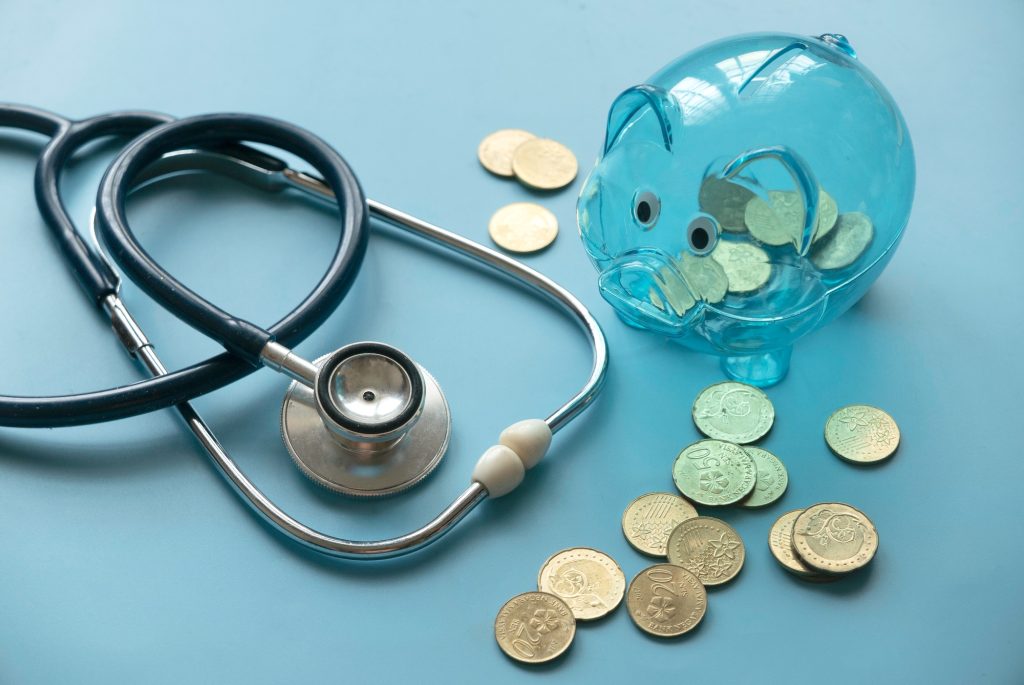 Concept of saving for Medical insurance costs or expense and financial checkup.